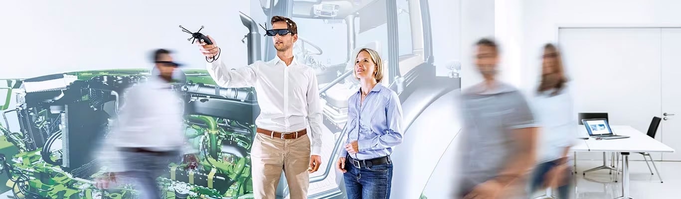 Collage of man infront of engine graphic, man operating VR glasses and remote with woman watching in front of tractor graphic, man and woman in a blur walking in office setting.