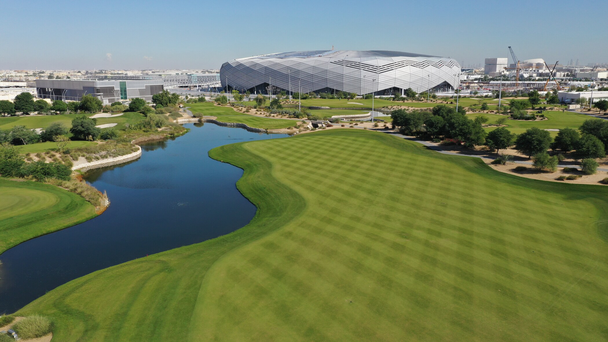 A view over the Education City golf course, with the 2022 FIFA World Cup Education City Stadium in the background.
