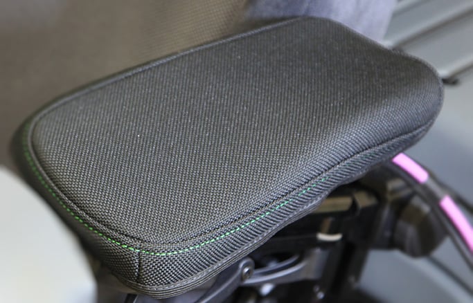 Arm rest cover for a seat
